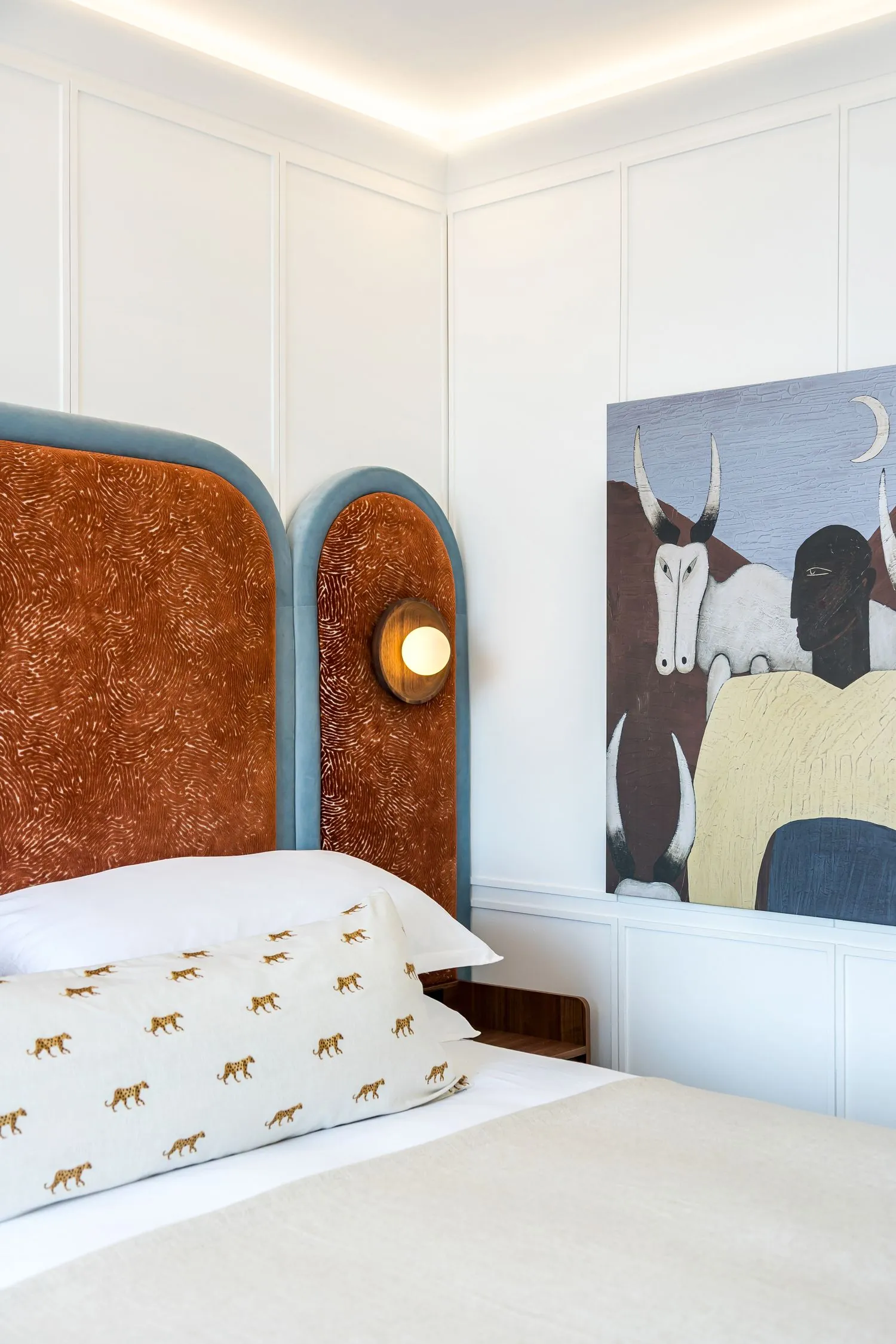 The headboard and the artwork